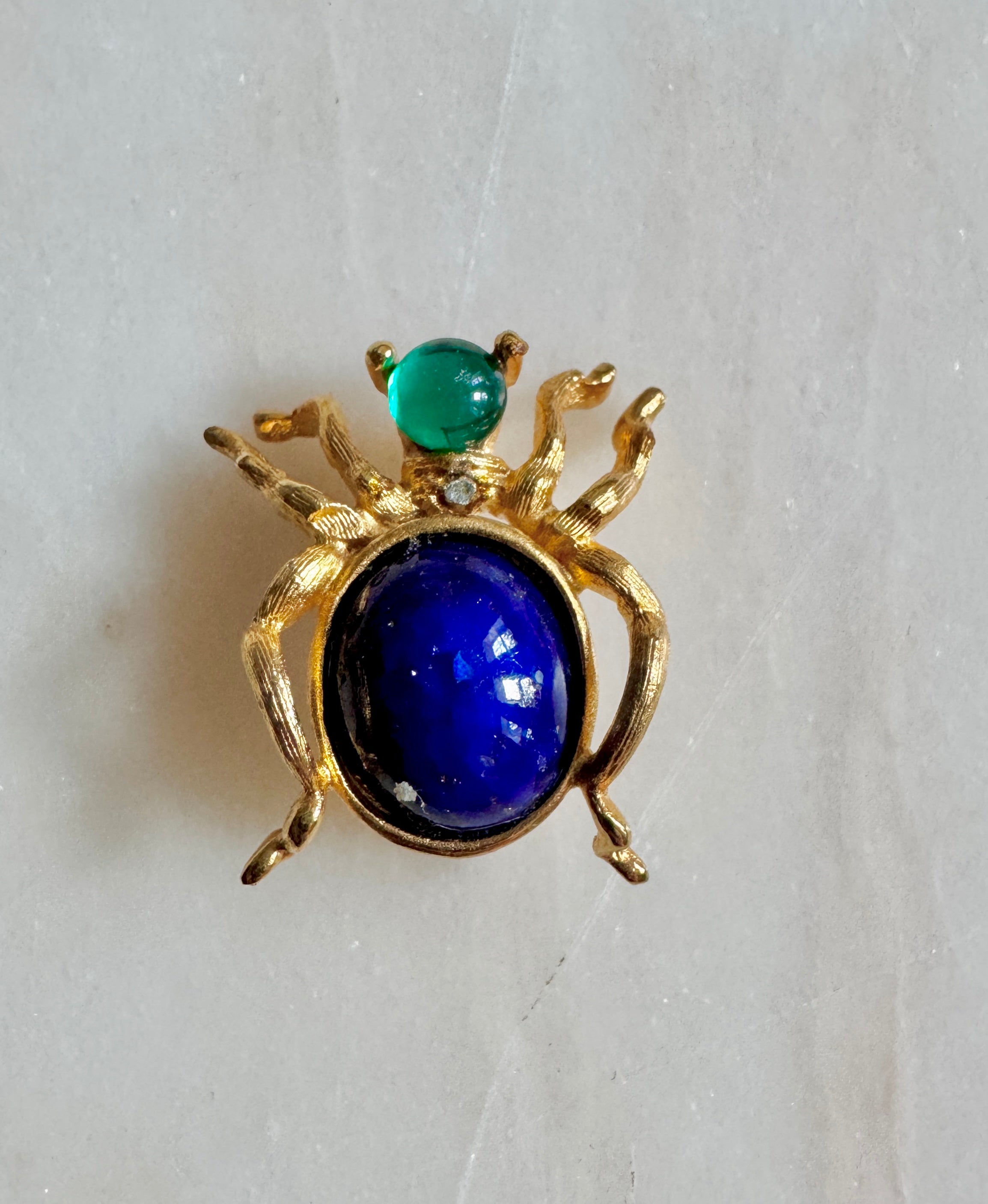 Vintage Costume Jewelry Spider Pin with Blue Stone and Gold Tone Frame