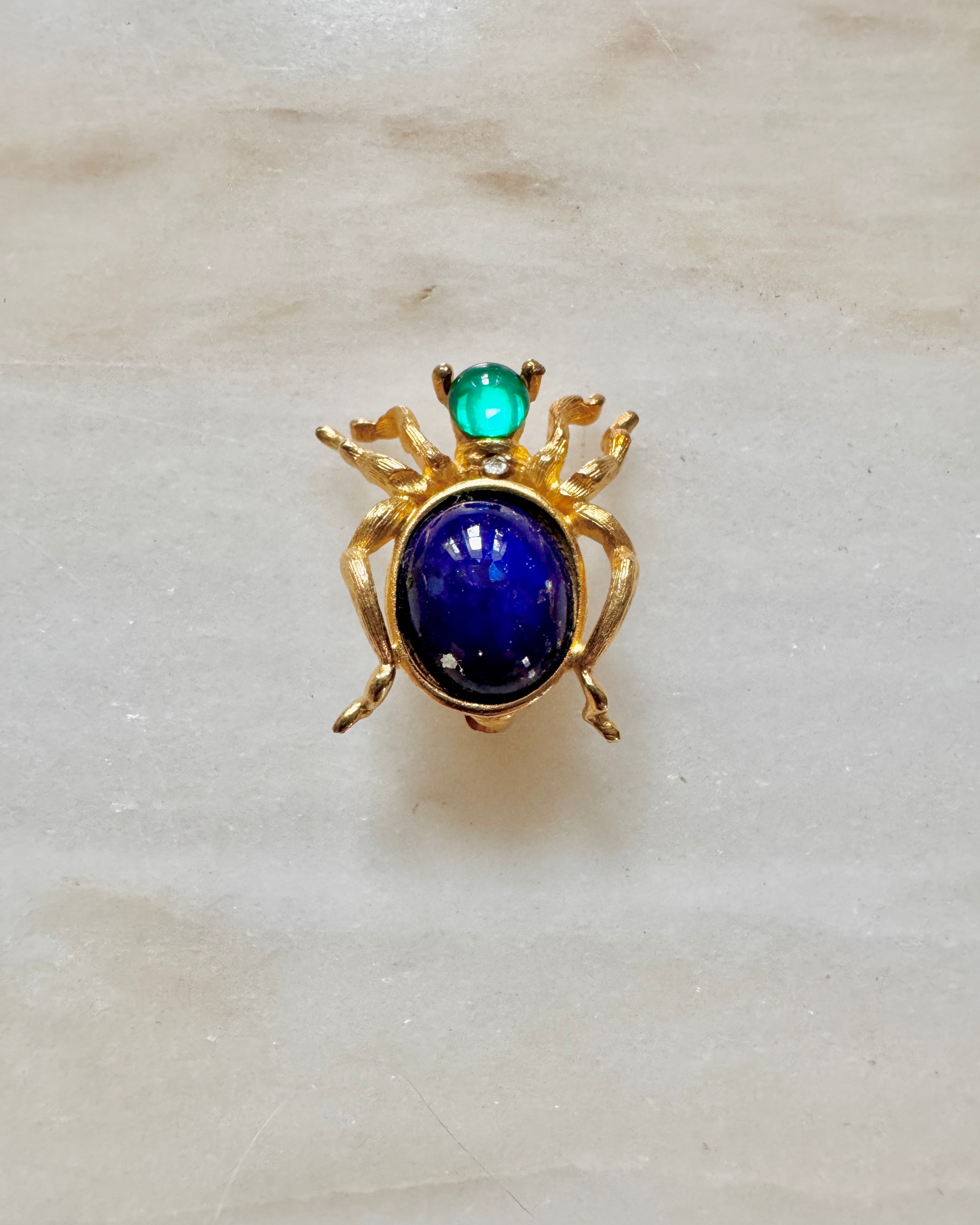 Vintage Costume Jewelry Spider Pin with Blue Stone and Gold Tone Frame