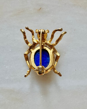 Vintage Costume Jewelry Spider Pin with Blue Stone and Gold Tone Frame