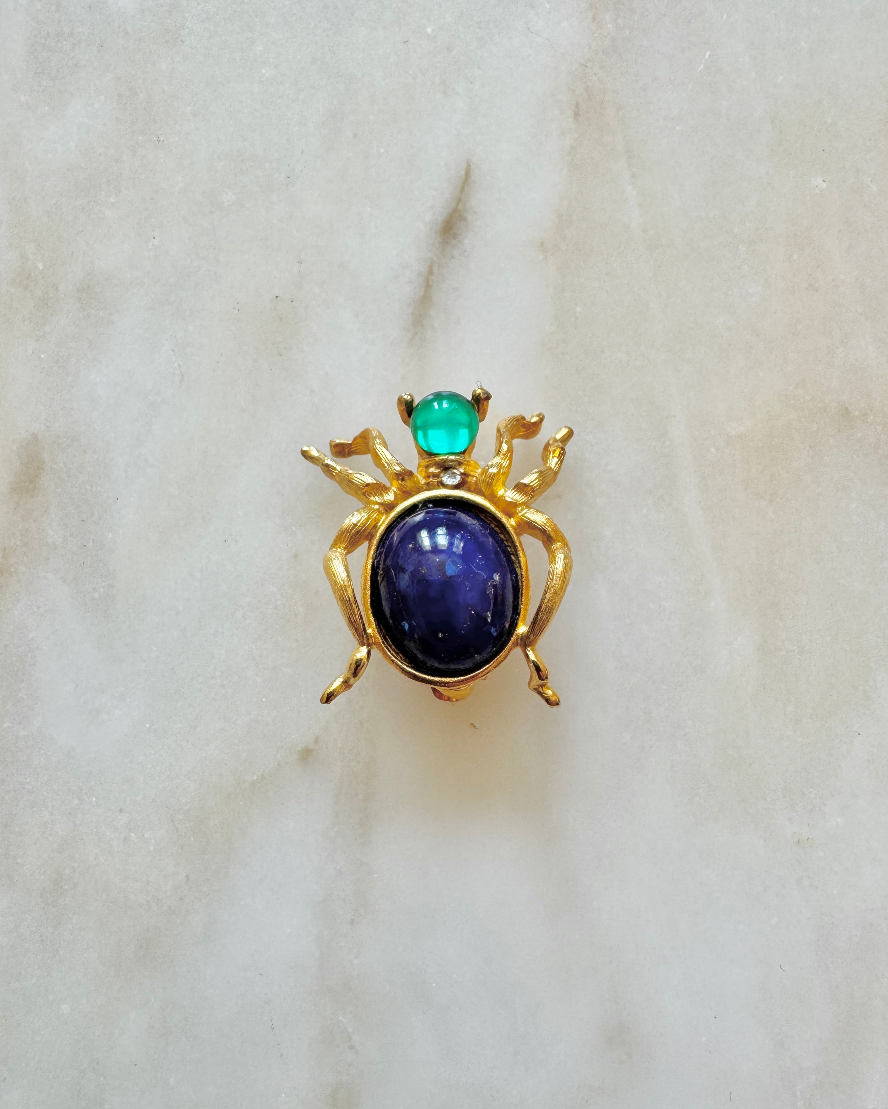 Vintage Costume Jewelry Spider Pin with Blue Stone and Gold Tone Frame