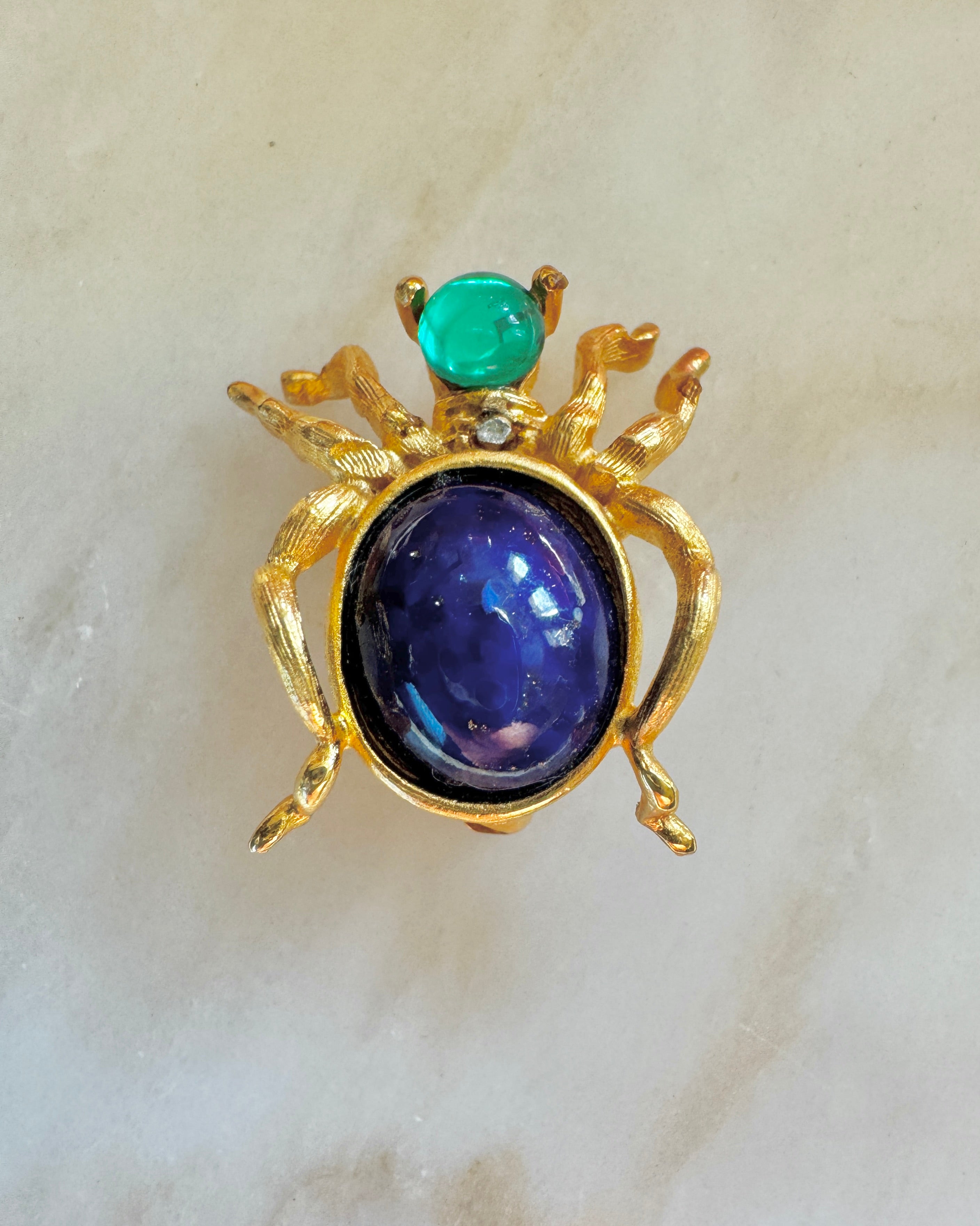 Vintage Costume Jewelry Spider Pin with Blue Stone and Gold Tone Frame