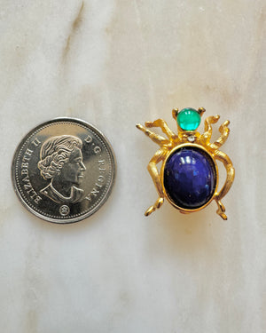 Vintage Costume Jewelry Spider Pin with Blue Stone and Gold Tone Frame