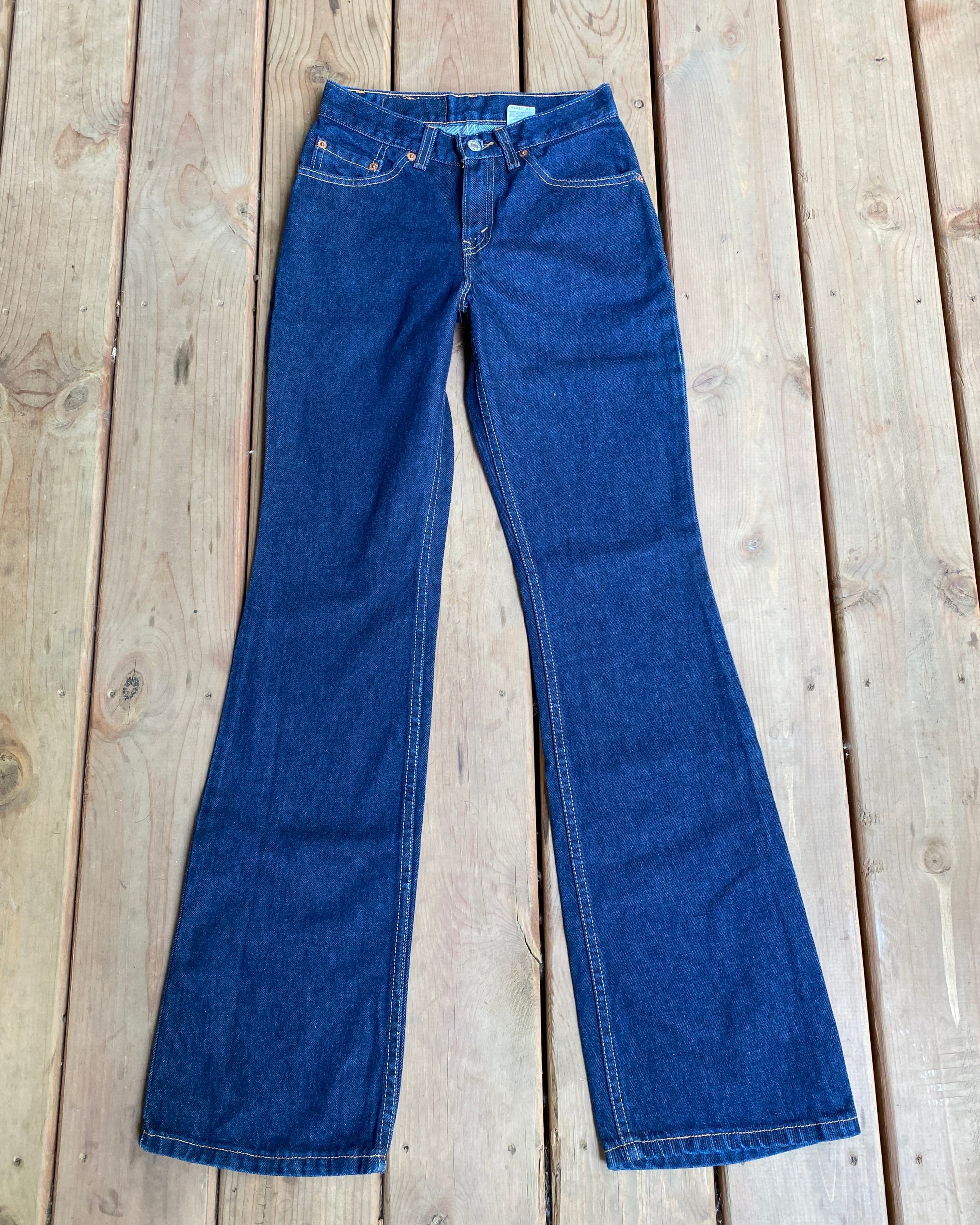 Vintage early 2000s Deadstock Levis 517 Flare Bootcut Low Rise Slim Fit Jeans with a Dark Wash size 25 to 26 Made in USA