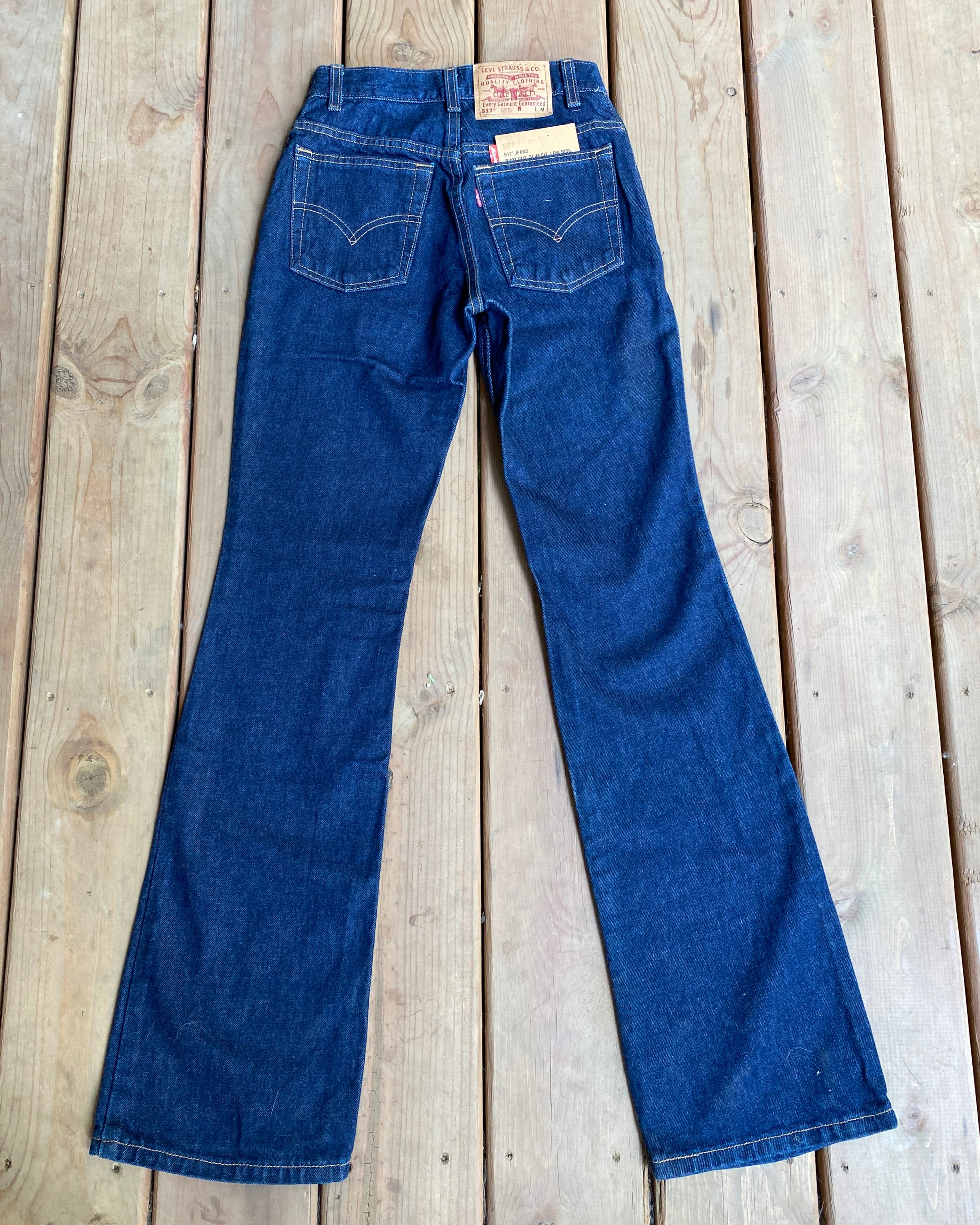 Vintage early 2000s Deadstock Levis 517 Flare Bootcut Low Rise Slim Fit Jeans with a Dark Wash size 25 to 26 Made in USA